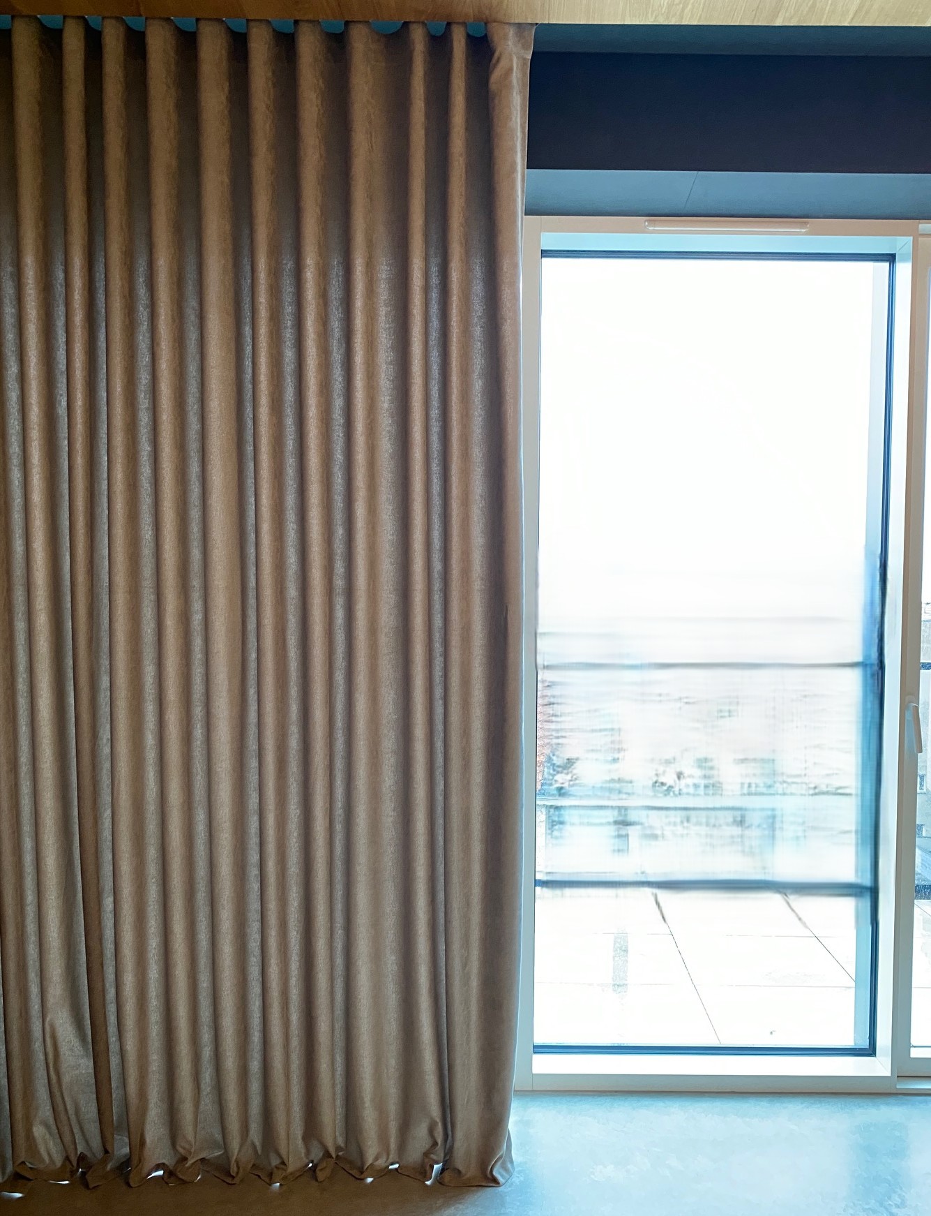 Curtain drawn to the side